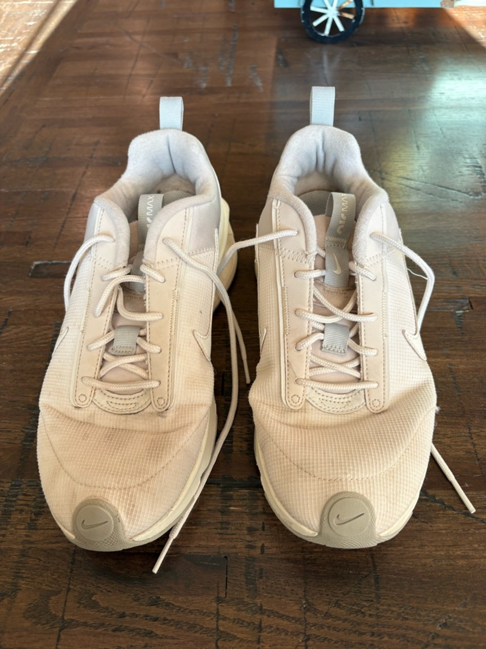 Nike athletic sneakers. Gently used. White. Women’s 10 or Mens 8.5.